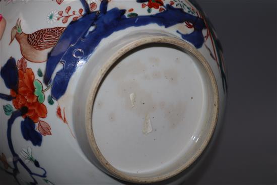 An 18th century Chinese verte Imari bowl on wood stand, c.1740, diameter 26cm